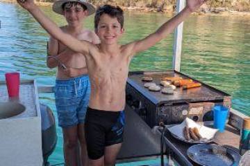 a person standing in front of a boat