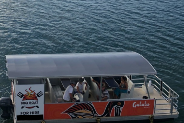 a small boat in a body of water