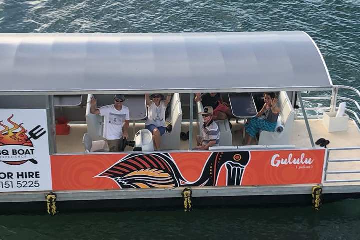 a small boat in a body of water