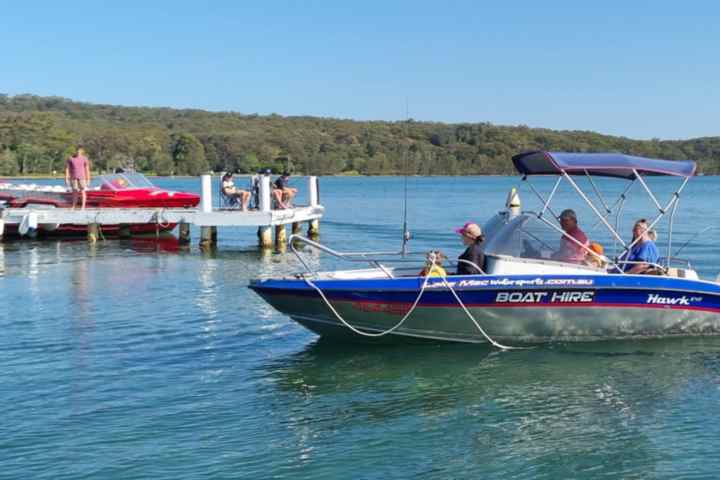 a small boat in a body of water