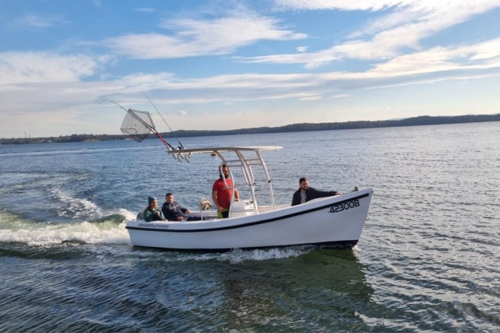 a small boat in a body of water