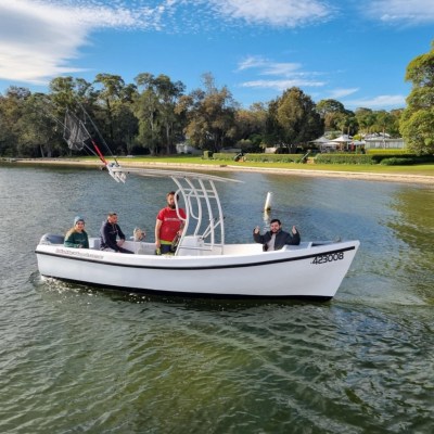 a small boat in a body of water