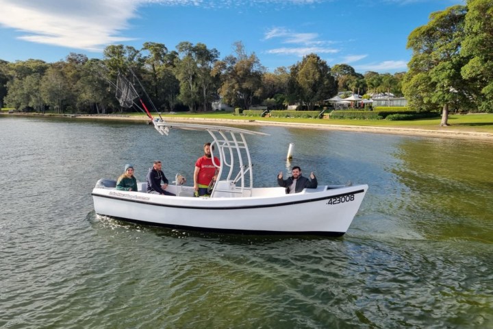 a small boat in a body of water