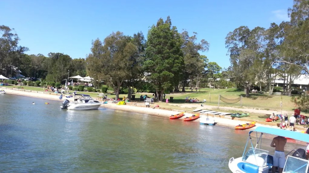 a small boat in a body of water